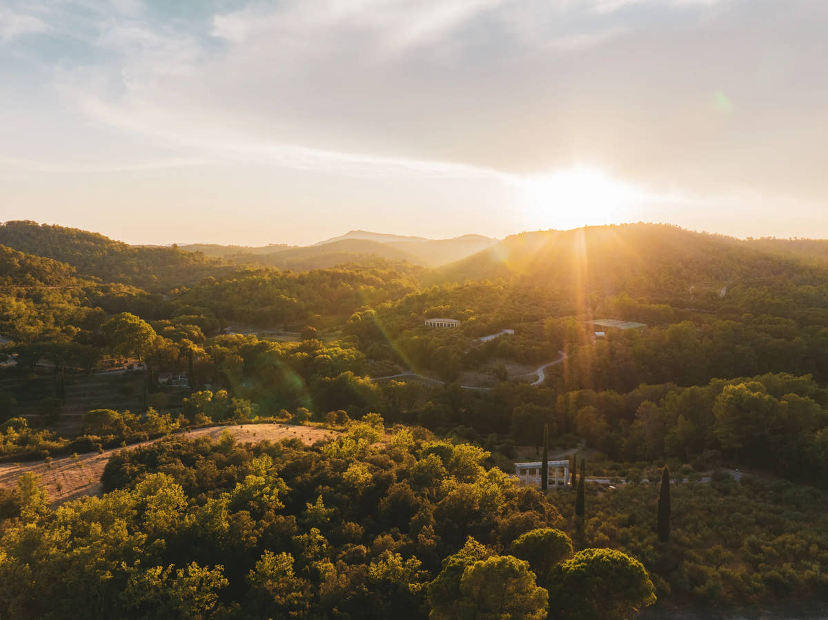 Sunset over the wooded hills — Domaine Fontainebleau en Provence
